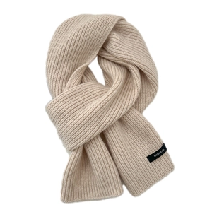 Classic creamy white 100% wool knitted scarf with warm thick rib-knit texture for winter