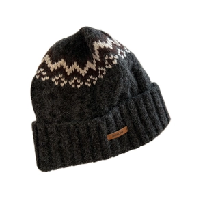 Thick dark gray winter knit hat with geometric jacquard pattern and ear protection design