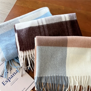 Classic wool blend plaid scarves with tassels in blue, brown, and beige color schemes