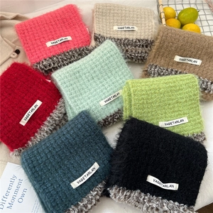 Winter chunky knit scarf for women available in 8 colors with plush trim and brand label