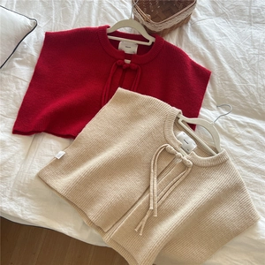 Knitted shawl vest with tie knot in red and beige colors for winter fashion