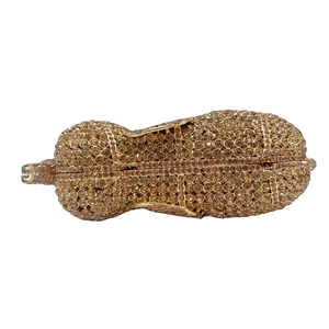 Champagne gold peanut-shaped crystal evening clutch bag with sparkling rhinestones
