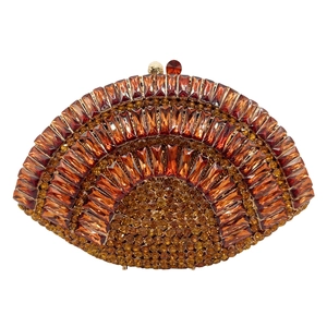 Detailed close-up of fan-shaped clutch with amber crystals and golden beads