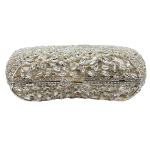 Luxurious crystal clutch bag with leaf pattern rhinestones on a silver frame