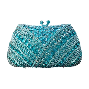 Macro shot of peacock blue crystal clutch bag with sparkling marquise rhinestones