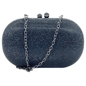 Close-up of black crystal clutch bag showing rhinestone detail and metal chain strap