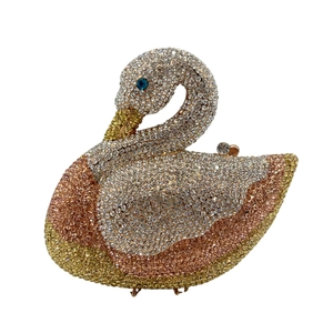 Swan-shaped crystal evening clutch bag with gradient gold and silver rhinestone encrusting
