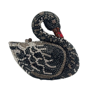 Elegant swan-shaped evening clutch bag adorned with black and silver crystals