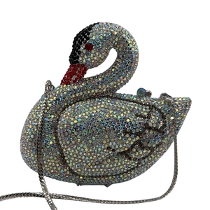 Macro view of crystal swan evening bag showing colorful rhinestones and silver chain