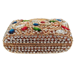 Luxurious rose gold clutch bag encrusted with colorful crystals and sparkling rhinestones
