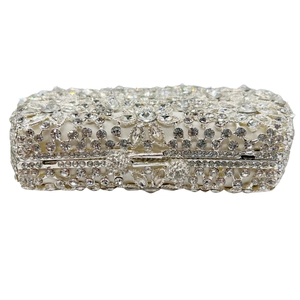 Luxury silver bridal clutch bag with intricate crystal rhinestones and floral gemstone patterns