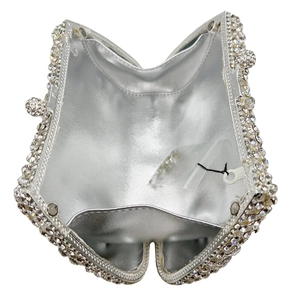 Elegant silver clutch bag with sparkling rhinestones and a geometric metal frame