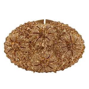 Golden crystal clutch evening bag with hollow flower pattern and diamond encrusted design
