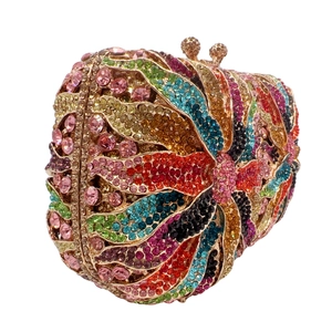 Macro detail of multicolored rhinestone floral pattern on elegant evening clutch bag