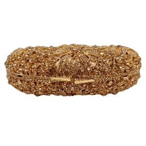 Golden crystal clutch evening bag with intricate rhinestone flower design for women
