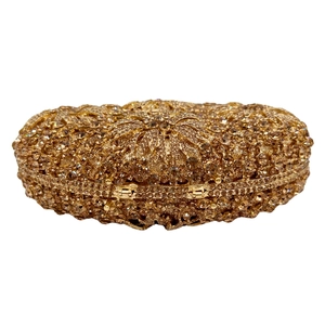 Sparkling crystal edelweiss clutch bag with gold rhinestone floral pattern for gala events