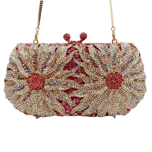 Exquisite hollow daisy diamond-studded clutch evening bag with pink and gold rhinestones