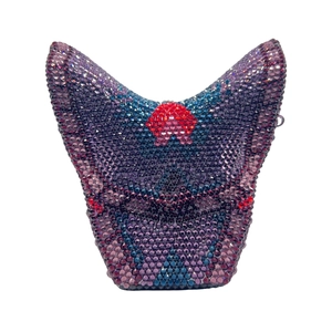 Detailed close-up of butterfly crystal clutch with purple and blue gradient rhinestones