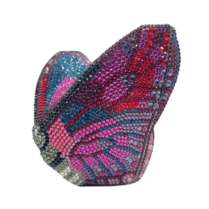 Detailed view of butterfly evening clutch with multi-colored crystals and metal frame