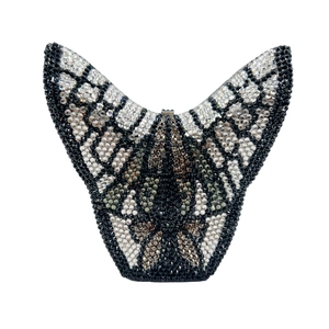 Detailed macro of crystal butterfly clutch bag with black and silver gradient rhinestones