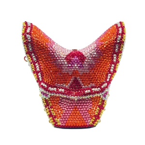 Macro shot of colorful gradient crystals on a butterfly evening clutch bag with metal clasp