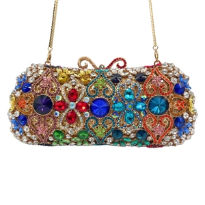 Luxury evening clutch with colorful crystals, hollow floral heart pattern and butterfly clasp