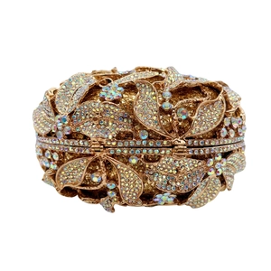 Pochette de soirée dorée ajourée à motif floral sertie de diamants brillants pour femmes