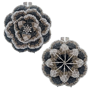 Macro shot of rose flower crystal evening clutch bag with intricate rhinestones detail