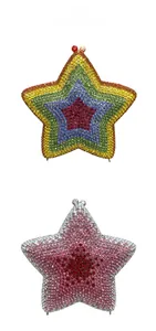 Close-up of star shaped crystal clutch bags with rainbow and pink rhinestone patterns