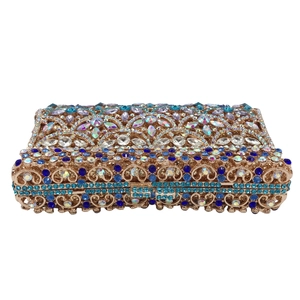 Detail of the golden hollow metal frame and colorful rhinestones on this luxury evening bag