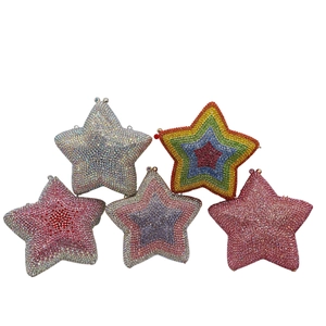 Close-up of star shaped clutch bags with glittering rhinestone crystals in various colors