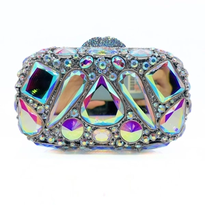 Macro shot of luxury clutch bag featuring multi-shape crystal rhinestones and metal frame