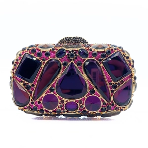 Detailed close-up of luxury purple crystal evening bag with gold metal frame