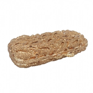 Detailed close-up of hollow gold crystal evening clutch with floral rhinestone patterns