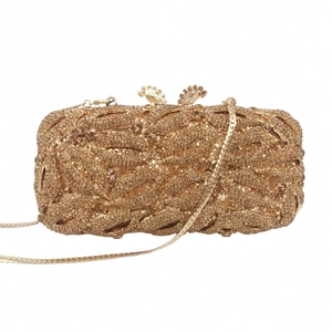 Close-up of the intricate rhinestone leaf texture and golden clasp on the evening clutch