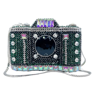 Detailed view of luxury camera clutch bag with colorful rhinestones and silver chain