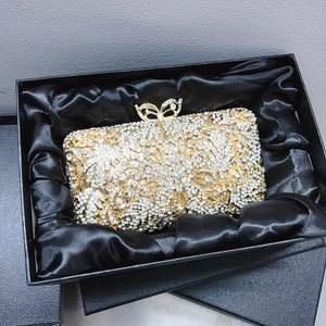 Exquisite hollow floral evening clutch with crystals and premium gift box packaging