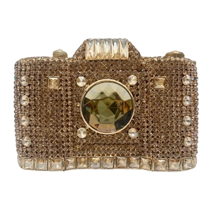 Detail of camera-shaped clutch bag with champagne rhinestones and emerald-cut crystals