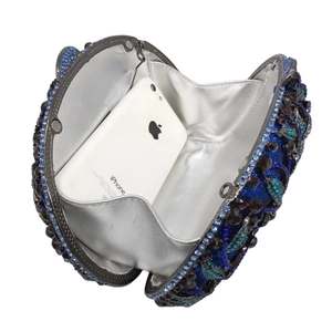 Luxurious rhinestone evening clutch bag with blue crystals and silver metallic lining