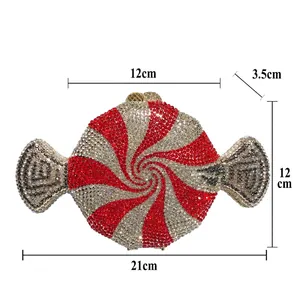 Candy-shaped evening bag with red and white spiral rhinestones and dimensions shown