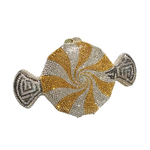 Sparkling candy-shaped clutch bag with silver and gold rhinestones in a spiral pattern