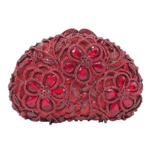 Detailed view of luxury red rhinestone clutch with floral crystal embellishments