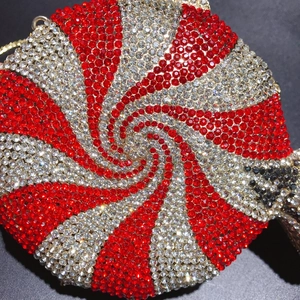 Sparkling candy swirl evening clutch bag with red and white rhinestones and gold chain