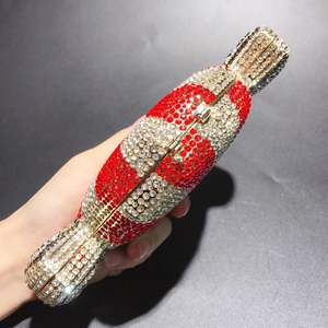 Detail shot of striped red and white rhinestone encrusted candy shaped clutch bag