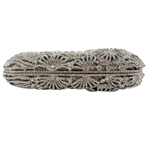 Vertical crystal clutch bag featuring silver rhinestones in floral patterns and chain strap