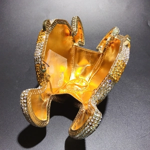 Detail of frog evening bag with gold crystals, metal lining and chain strap