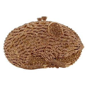 Detailed view of rose gold mouse-shaped clutch bag with sparkling rhinestone crystals