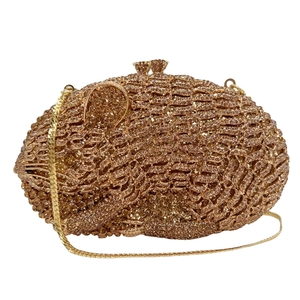 Luxury mouse shaped clutch bag encrusted with sparkling champagne rhinestones and gold chain