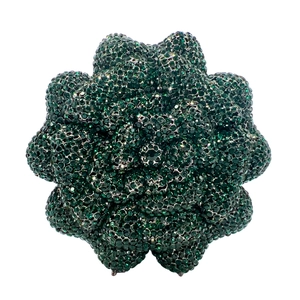 Macro shot of dark green crystal petals on a luxury flower-shaped evening clutch bag
