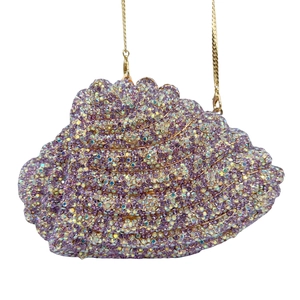Detail of purple gradient crystal conch clutch with luxury gold metal chain strap